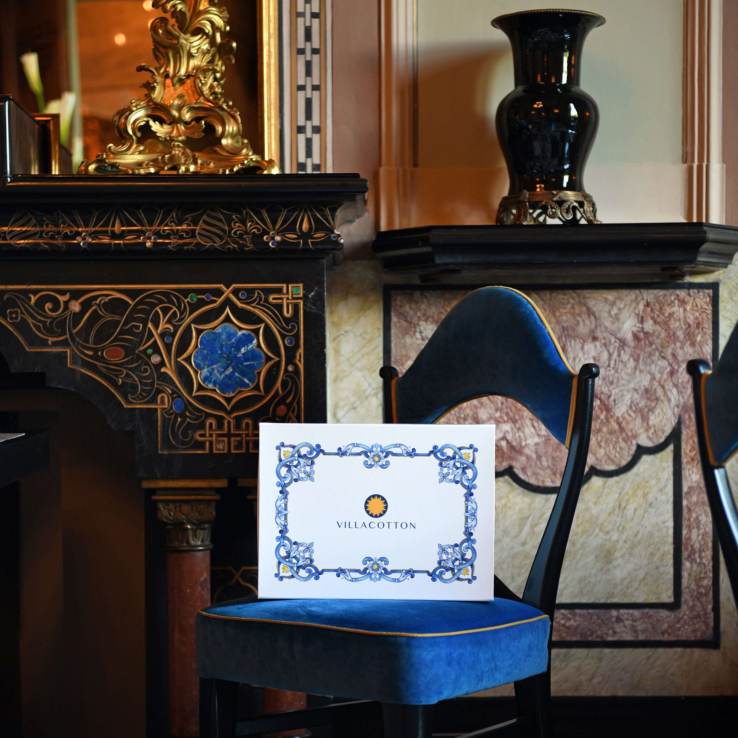 Villa Cotton luxury packaging box in classic Italian interior, symbol of elegant bedding presentation